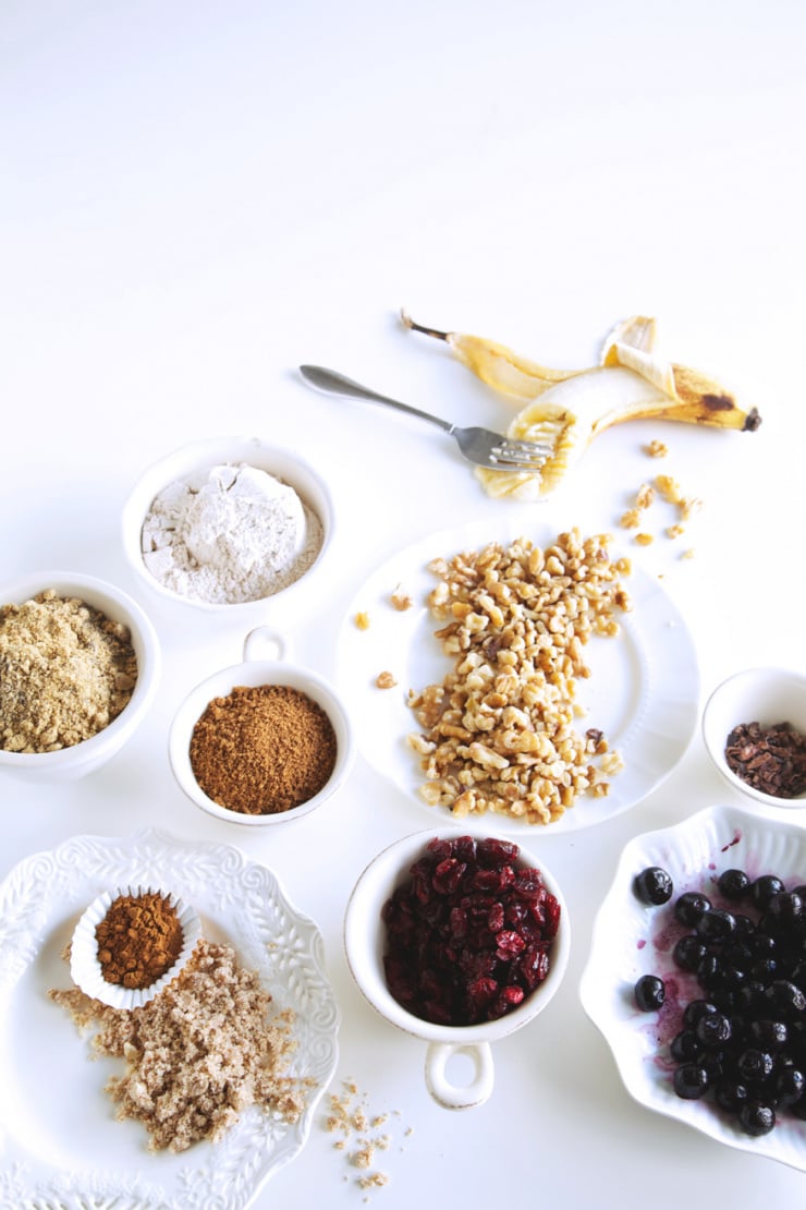 A slight 3/4 angle shot shows ingredients needed for a batch of vegan power muffins.