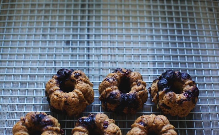 An overhead shot shows freshly baked power muffins on a cooling rack.