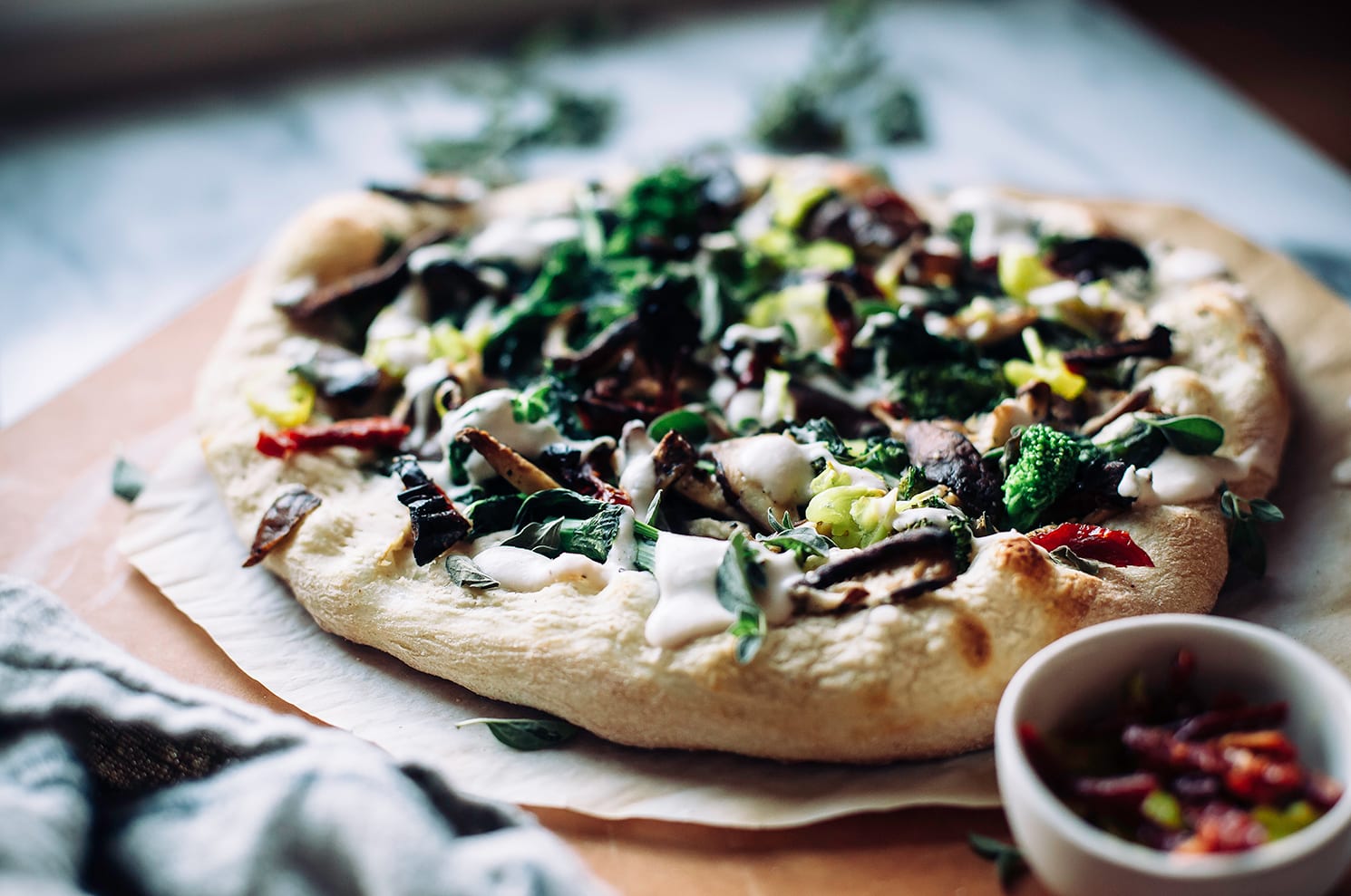 https://thefirstmess.com/wp-content/uploads/2017/02/14-8299-post/vegan-white-pizza-recipe-with-broccoli-rabe-7.jpg