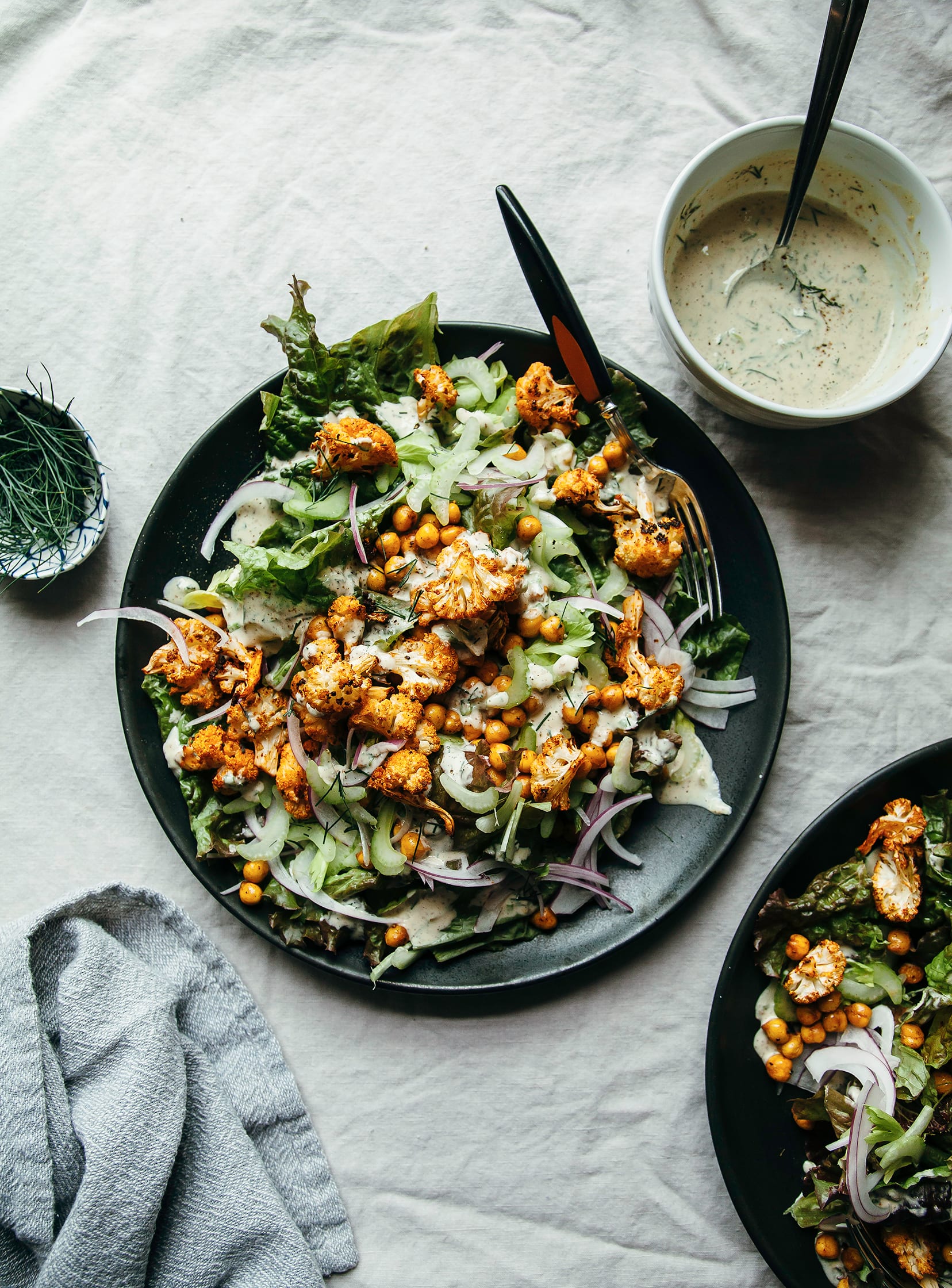 https://thefirstmess.com/wp-content/uploads/2017/07/25-8852-post/vegan-buffalo-cauliflower-salad-tahini-ranch-recipe-10.jpg