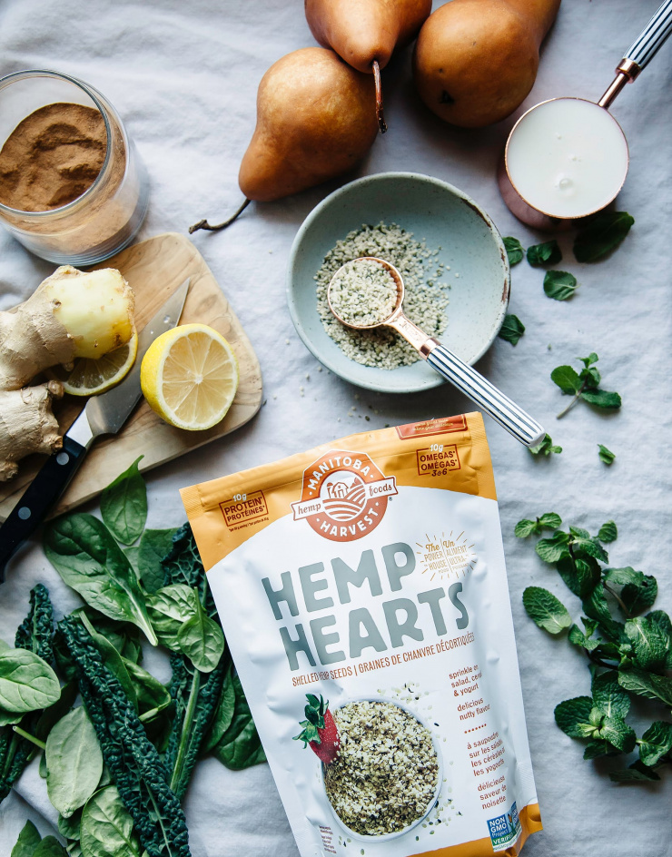 An overhead image of ingredients for a winter glow green smoothie.