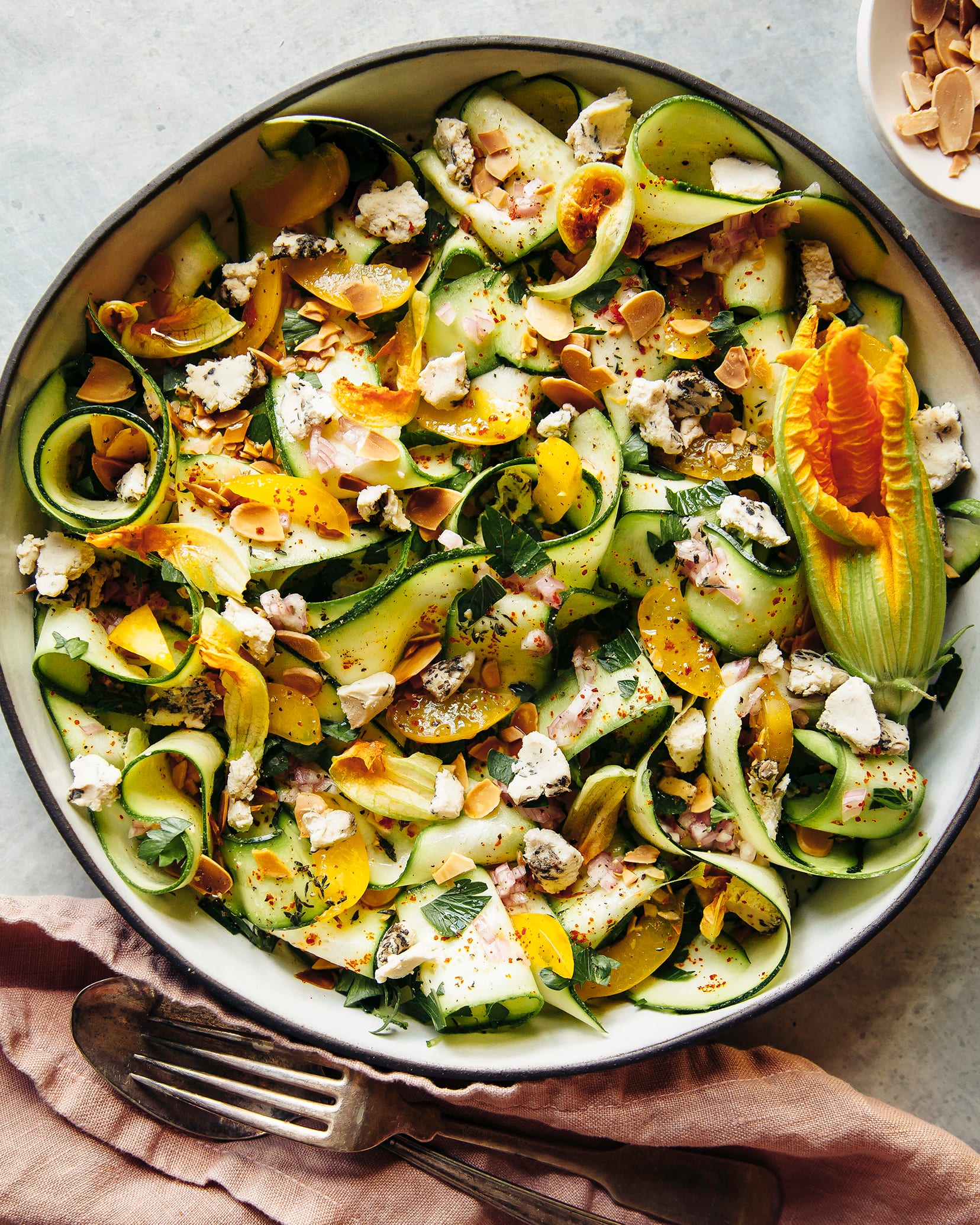 Shaved zucchini salad with plums, herbs and almonds.