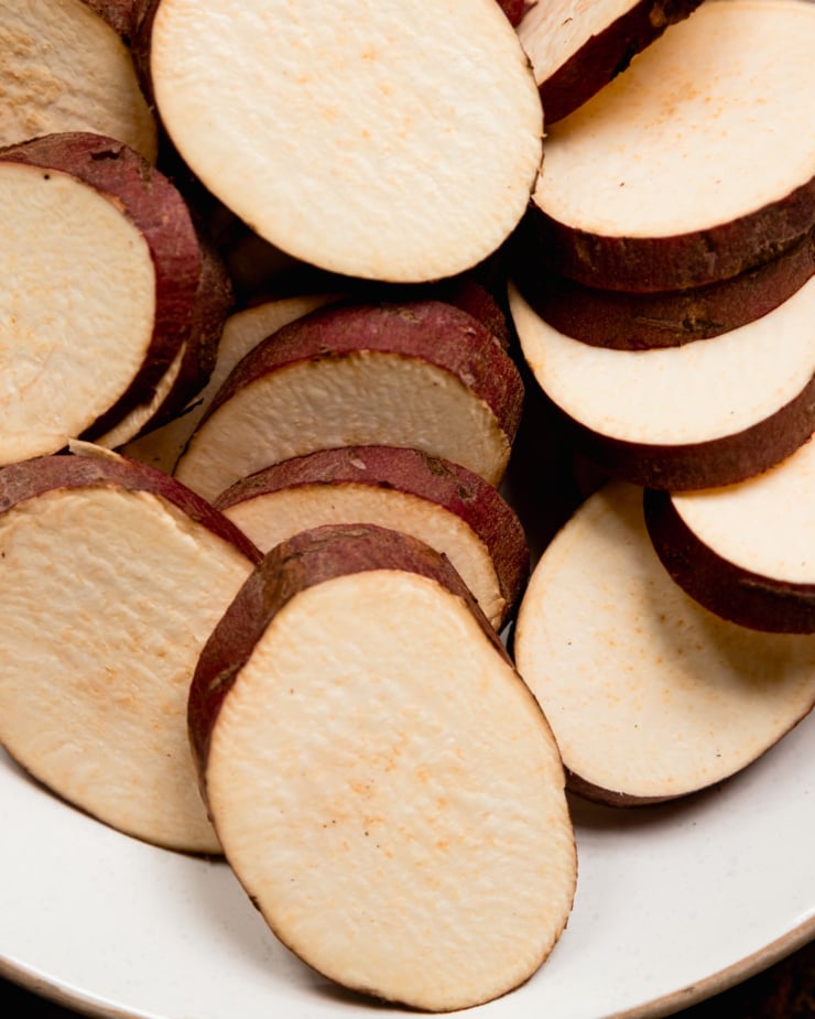 The overhead lens shows the sliced Japanese sweet potatoes.