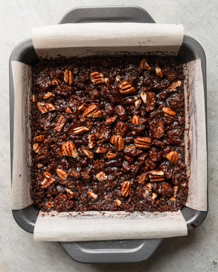 Top view shows a plate of toasted chocolate pecan bars.
